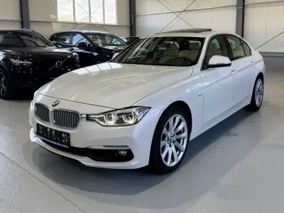 BMW Seria 3 318i Aut. Luxury Line 2018 · 218.000 km